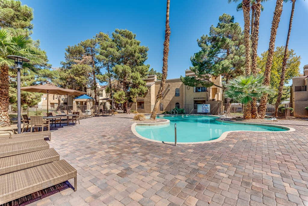 take a dip in our resort style swimming pool at Pacific Harbors Sunrise Apartments, Las Vegas, NV