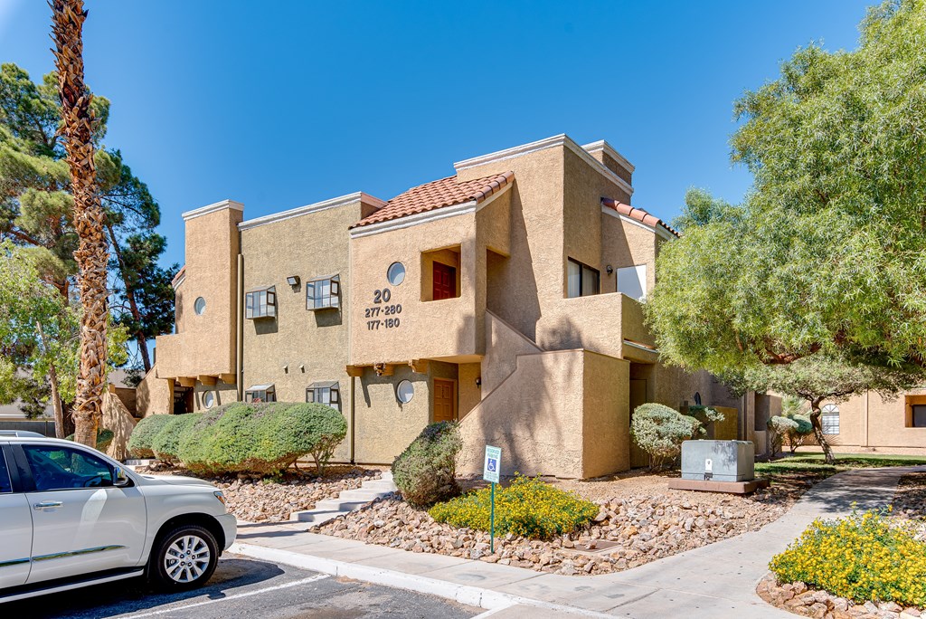 a car parked in front of a building at Pacific Harbors Sunrise Apartments, Las Vegas, Nevada