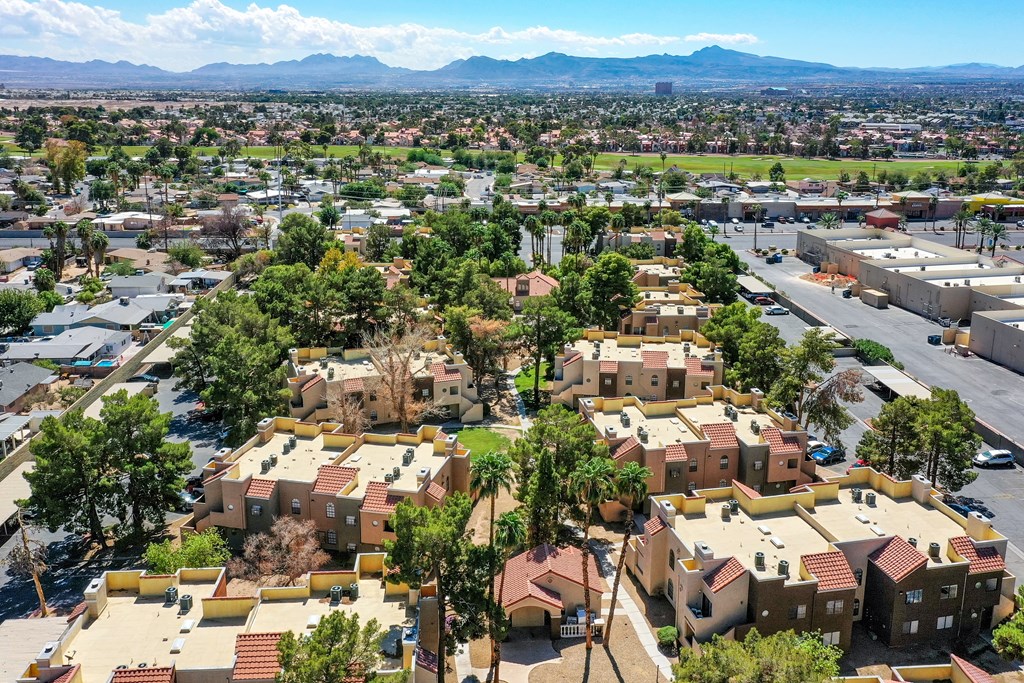 an aerial view of a neighborhood with houses and trees at Pacific Harbors Sunrise Apartments, Las Vegas, Nevada
