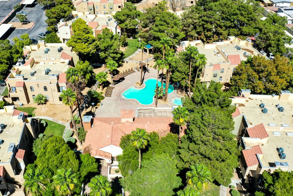 an aerial view of a house with a pool in the middle of a neighborhood at Pacific Harbors Sunrise Apartments, Las Vegas, NV, 89142