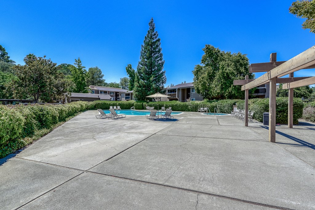 take a dip in the pool at the enclave at woodbridge apartments in sugar land, tx