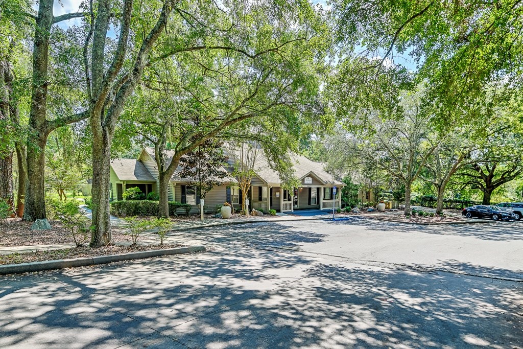 A residential area with houses and trees.