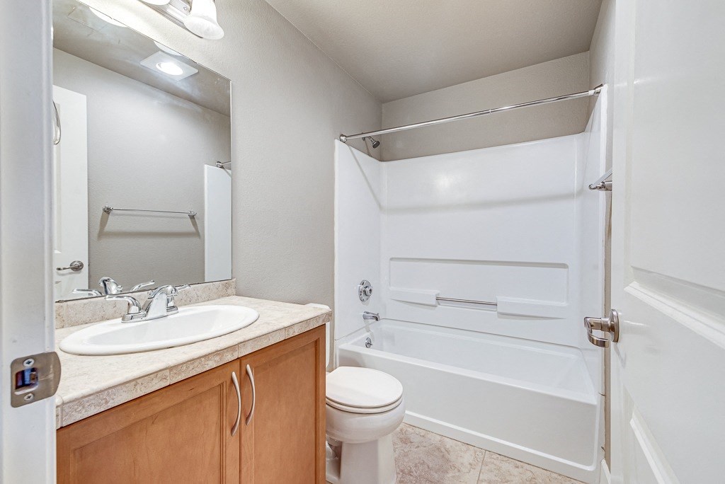 Bathroom with vanity and tub at Village at The Pointe Apartments, Tacoma, WA,98407