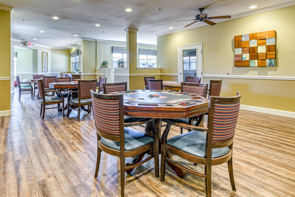 game room with chairs and tables