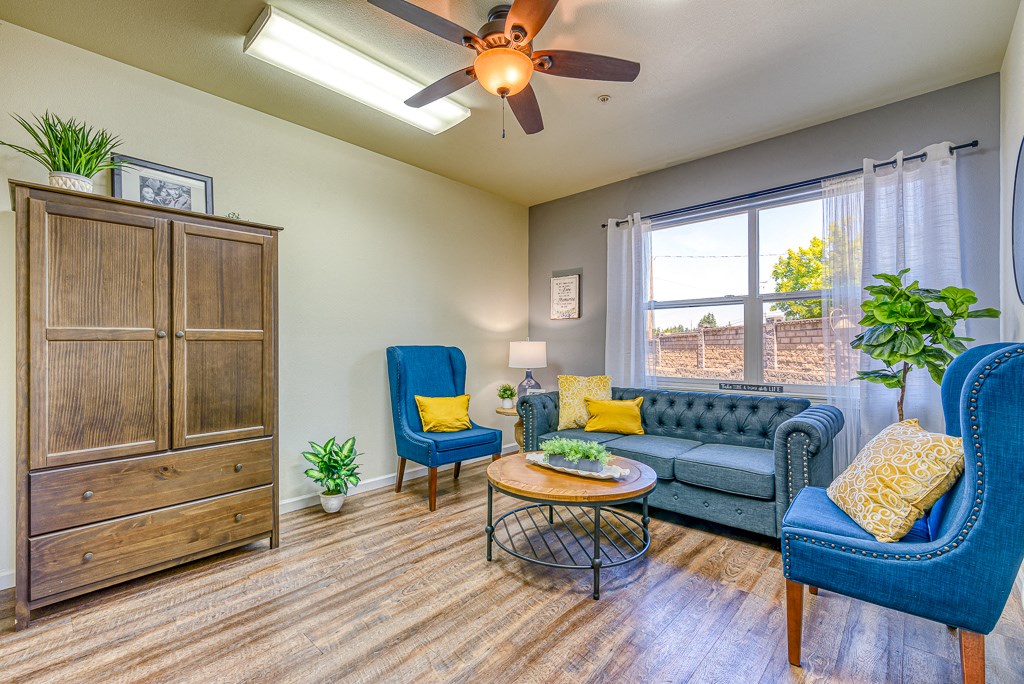 model apartment with vinyl flooring and seating area