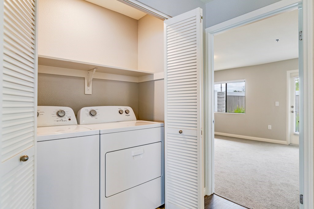 A laundry room with a washer and dryer.