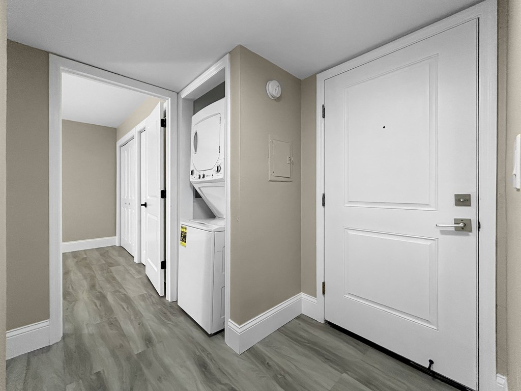 A white door is on the right side of the image.