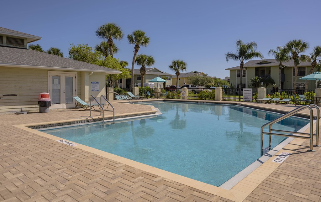 A small pool with a brick border.