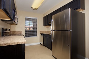 Renovated Kitchen at Sky Court Harbors at The Lakes Apartments, Las Vegas - Photo Gallery 9