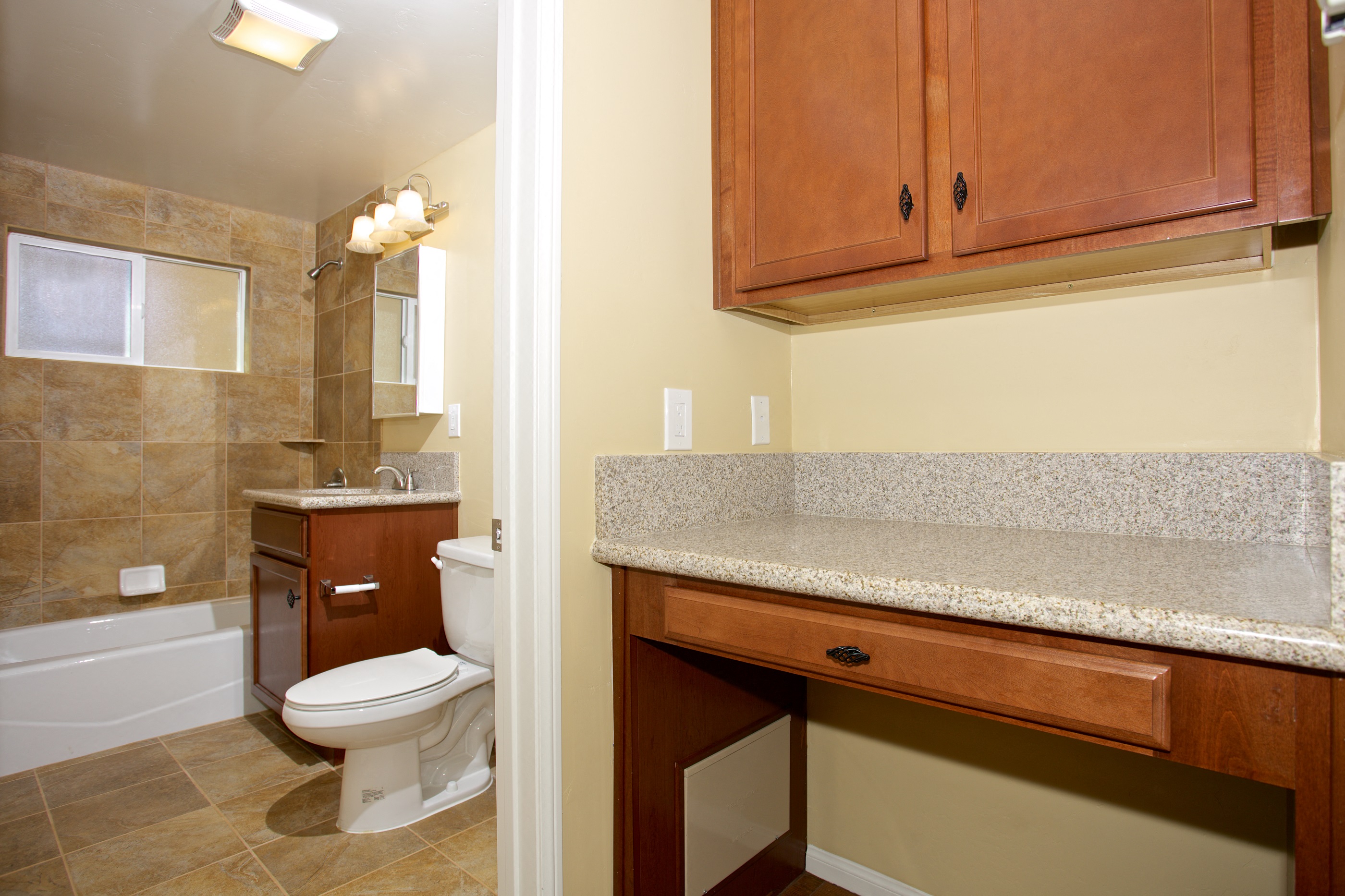 Bathroom With Adequate Storage at Woodlawn Gardens Apartments, Chula Vista, California