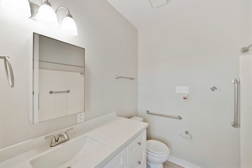a bathroom with a sink and a toilet at Azure Point at Encinitas, Encinitas