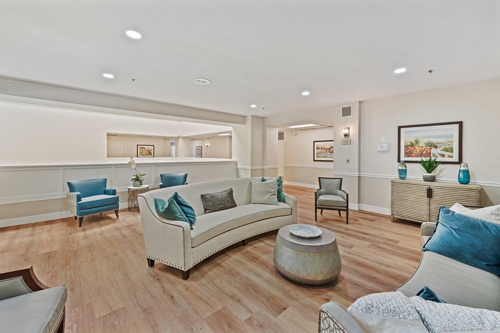 a living room filled with furniture and a large window at Azure Point at Encinitas, California
