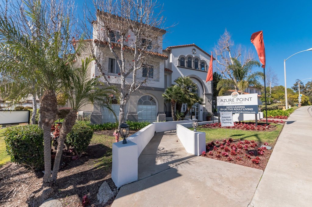 a large white house with palm trees in front of it at Azure Point at Encinitas, Encinitas, 92024