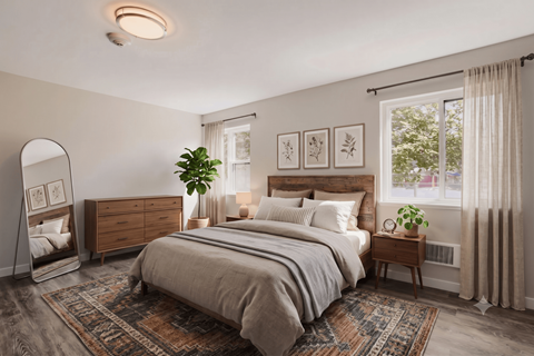 A bedroom with a large bed, a dresser, and a mirror.