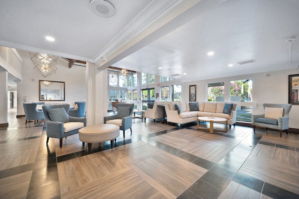 a lobby with couches chairs and tables at The Crest at Citrus Heights Apartments, Citrus Heights, CA,95621