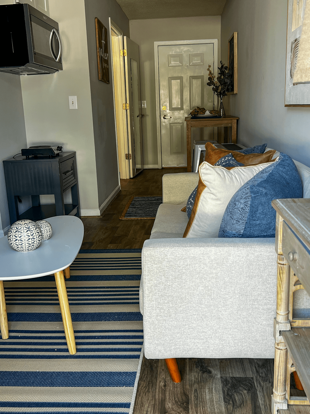 a living room with a couch and a table