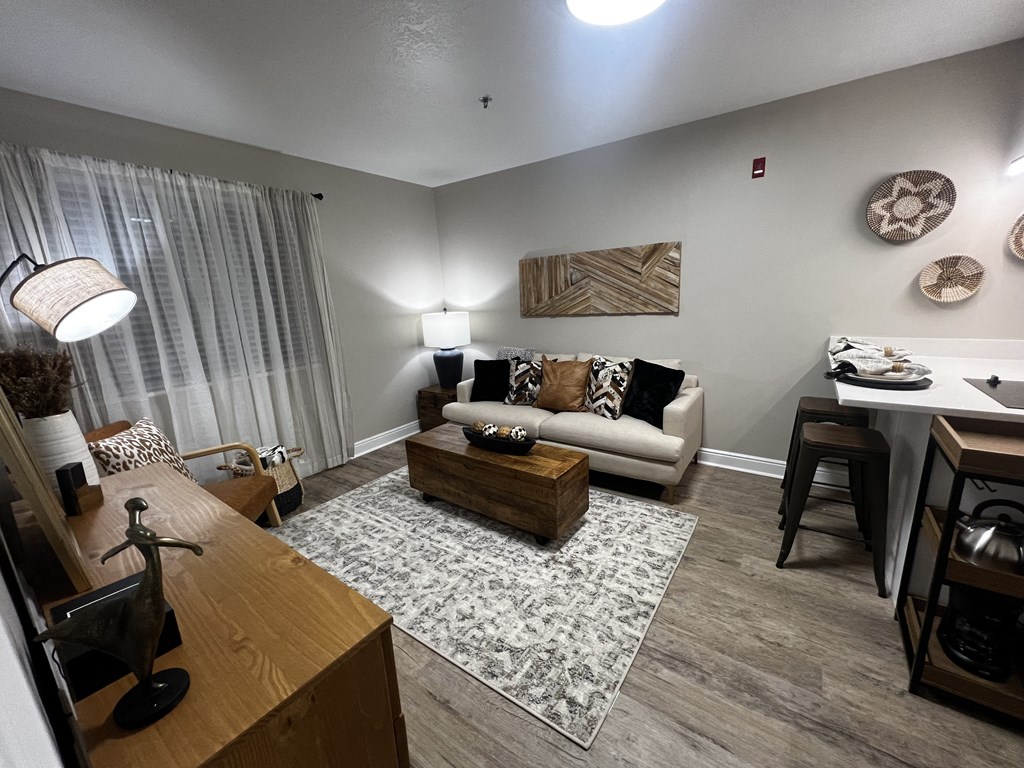 a living room with a couch and a table