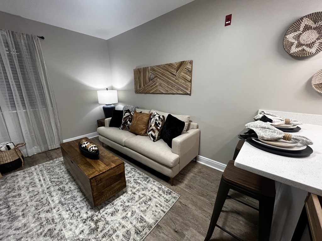 a living room with a couch and a table