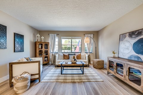 a living room with a couch and a coffee table