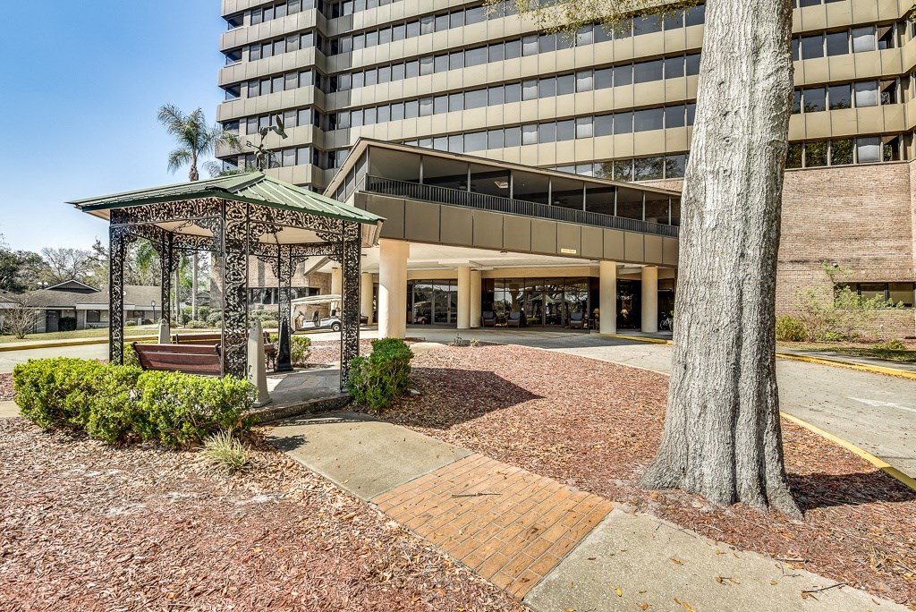 a gazebo in front of a building