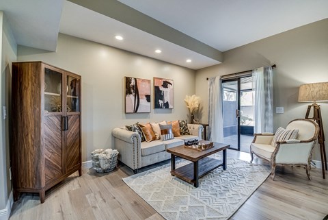 a living room with a couch and a table