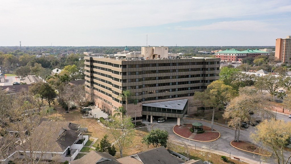 an aerial view of a large building in a city
