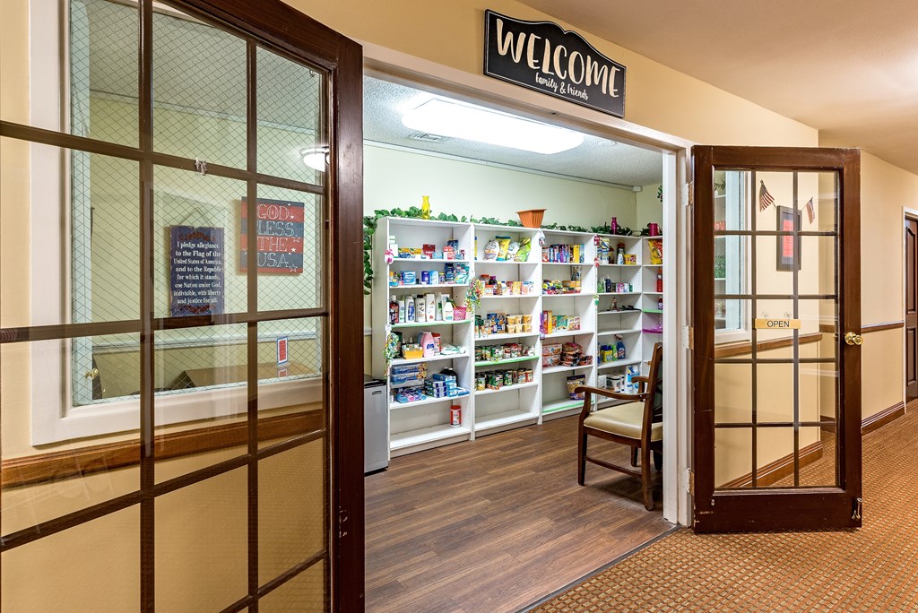 the entrance to the welcome area of a pharmacy with its door open