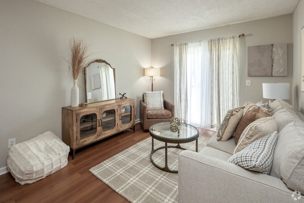 a living room with a couch and a table