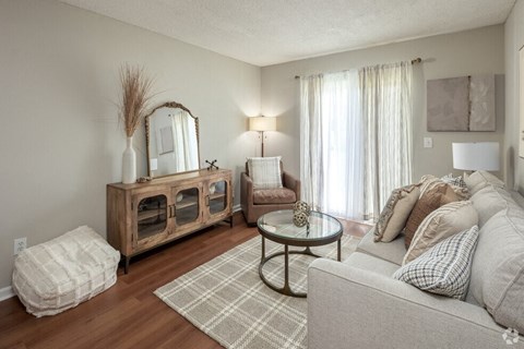 a living room with a couch and a table