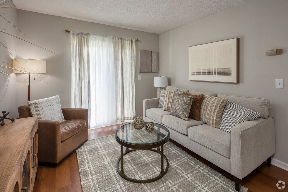 a living room with a couch and a coffee table