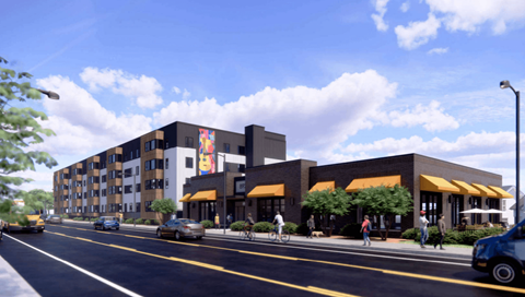 A street view of a building with cars and people.