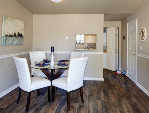 a dining room with a table and chairs at 2000 Lake Washington Apartments, Washington, 98056