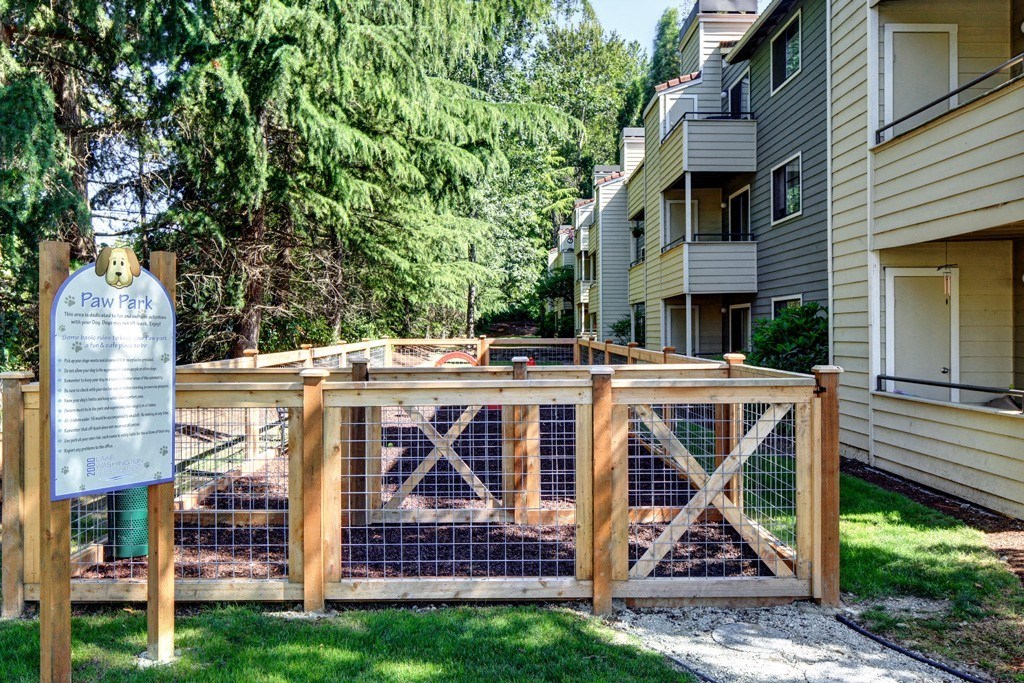 Pet Park with wooden fenced in boundaries at 2000 Lake Washington Apartments, Renton, 98056