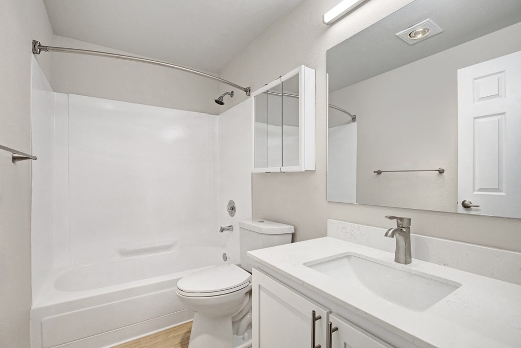 a bathroom with a sink toilet and a shower at 2000 Lake Washington Apartments, Washington