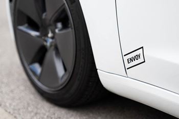 the wheel of a white car with a punctured tire  at The Belden Stratford, Chicago, Illinois
