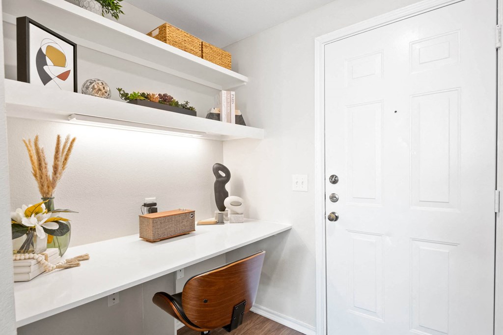 a home office with a desk and a white door at Mission Gate, Plano, TX