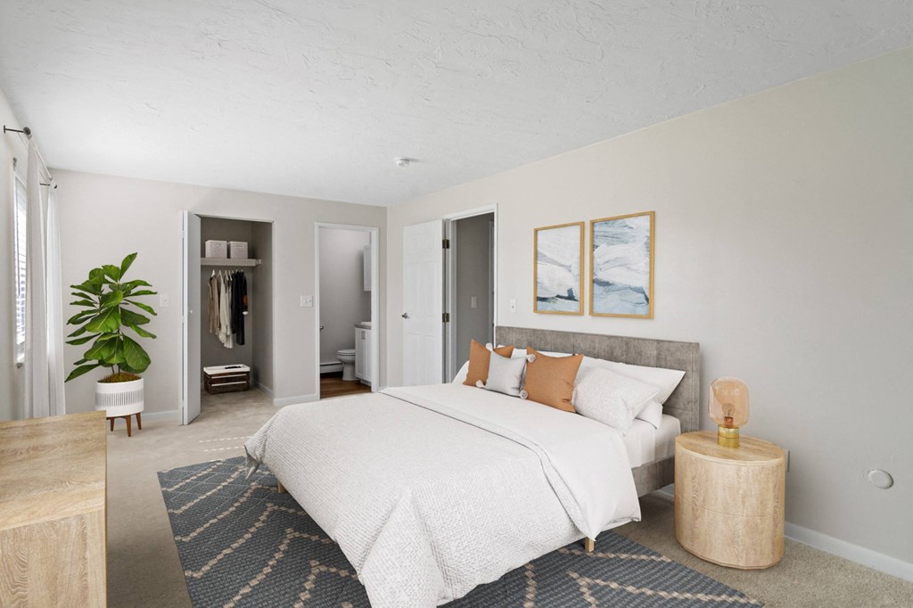Bedroom flooded with natural light at Rosemont Square Apartments, Randolph, MA, 02368