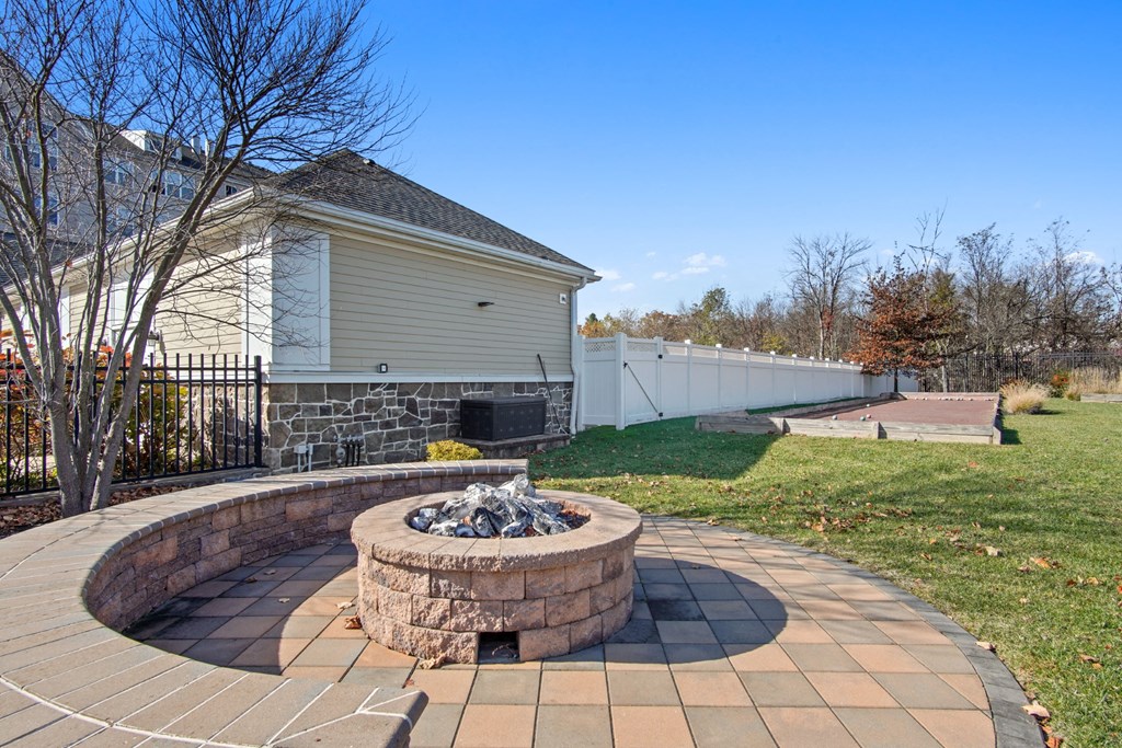 a backyard with a fire pit at Glen Mills in Glen Mills, PA