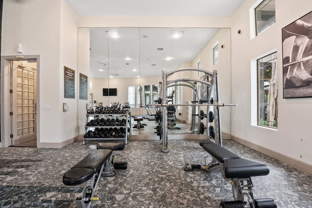 the preserve at ballantyne commons fitness room with weights and mirrors at Mission Gate, Texas, 75024