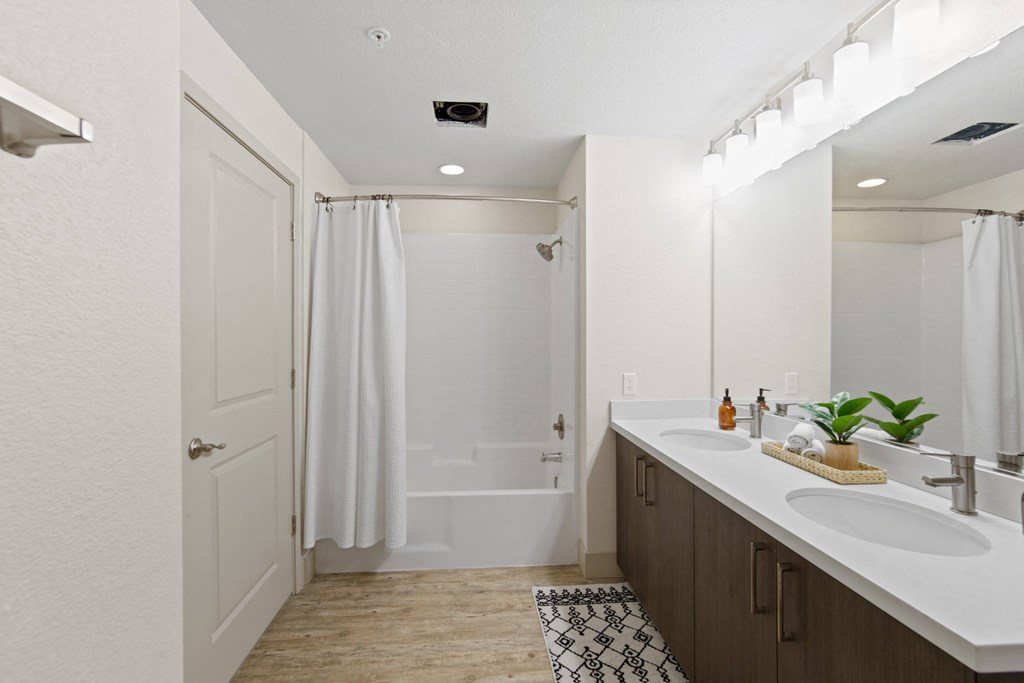 Unit Double Bathroom Vanity and Shower at Aventine Apartments in Hercules, CA 94547