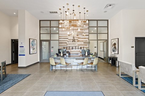 Leasing office lobby with wood accent wall at Aventine Apartments, Hercules