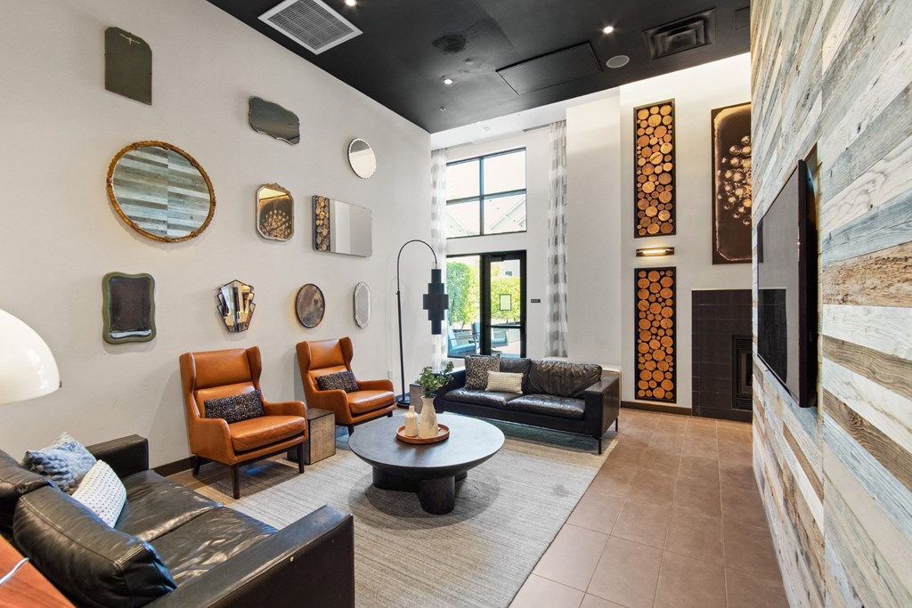 Common Area with Television and Couches at Aventine Apartments in Hercules, CA 94547