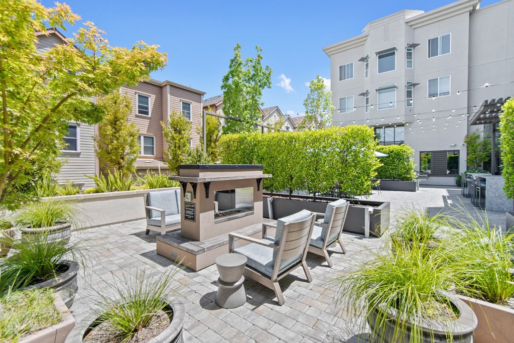 Outdoor Patio with Fire Pit and Seating at Aventine Apartments in Hercules, CA 94547