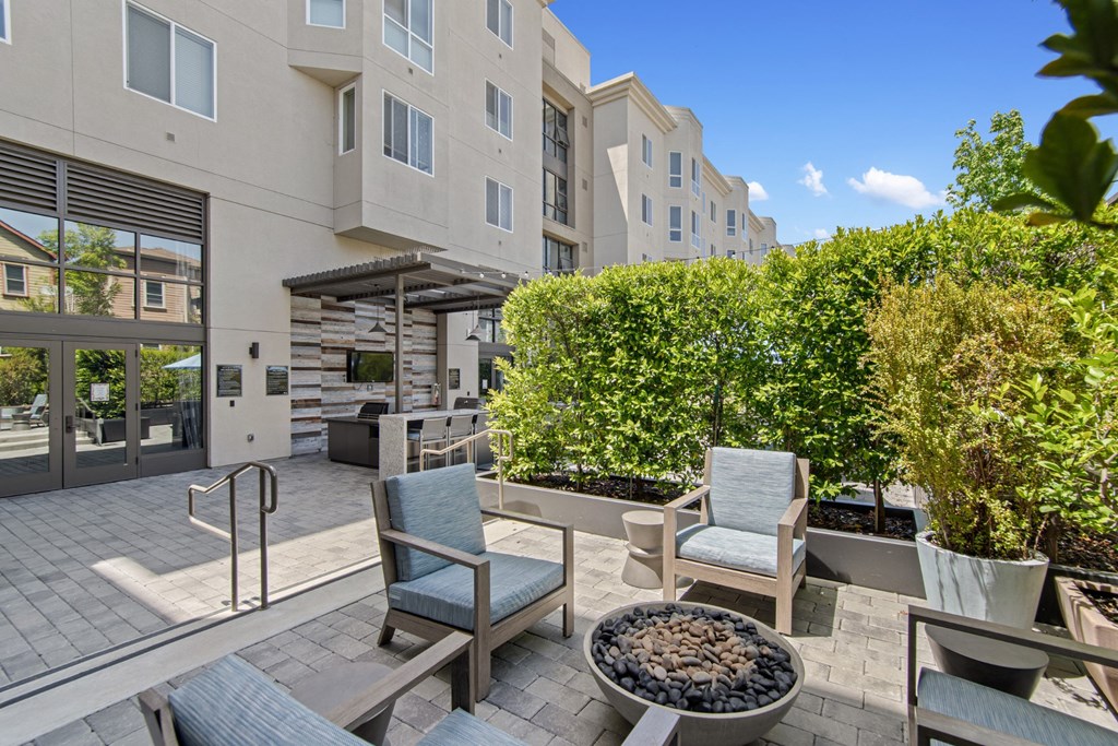 Outdoor Patio with Fire Pit and Seating at Aventine Apartments in Hercules, CA 94547