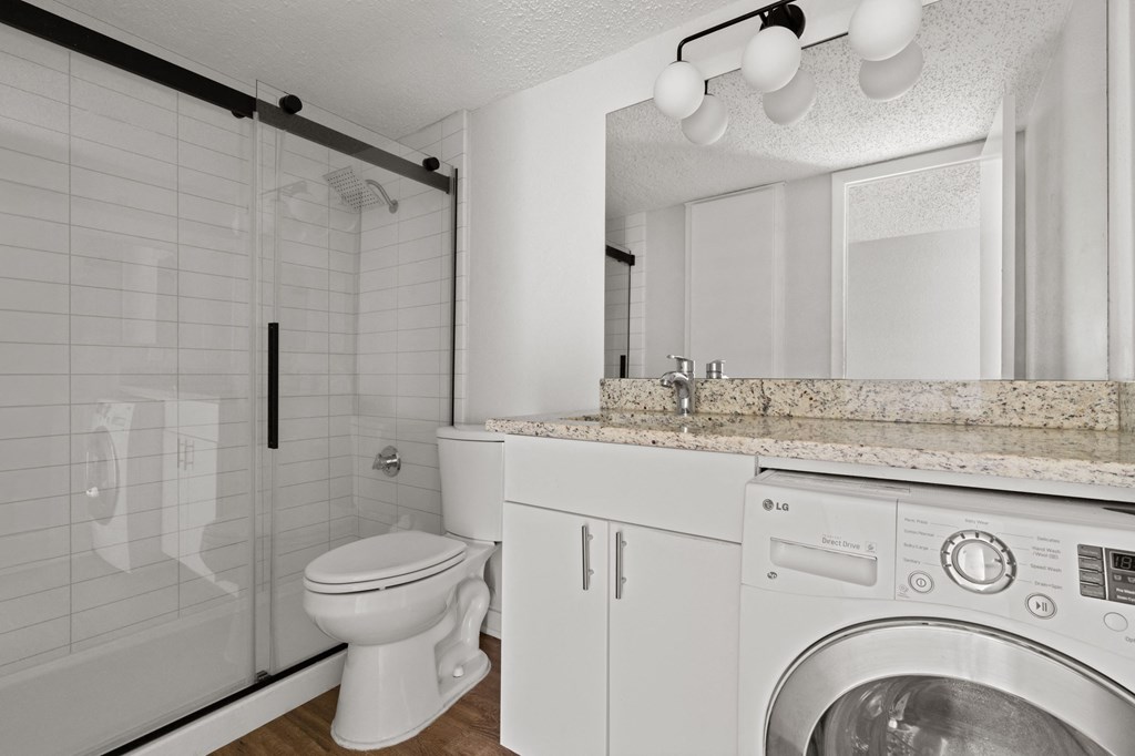 Bathroom and Laundry at South Lamar Village Apartments in Austin, TX 78704