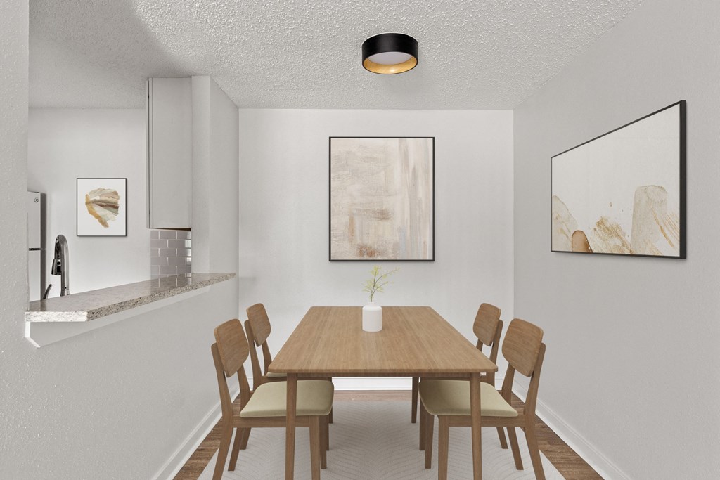 a dining room with a wooden table and chairs a dining room with a wooden table and chairs at South Lamar Village, TX, 78704