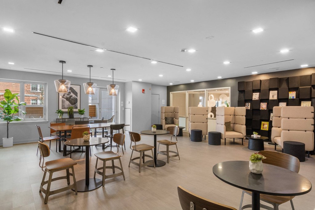 Spacious resident lounge at The Amelia Apartments in Quincy, MA