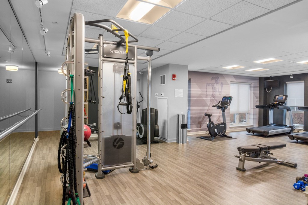 Strength equipment at The Amelia Apartments in Quincy, MA