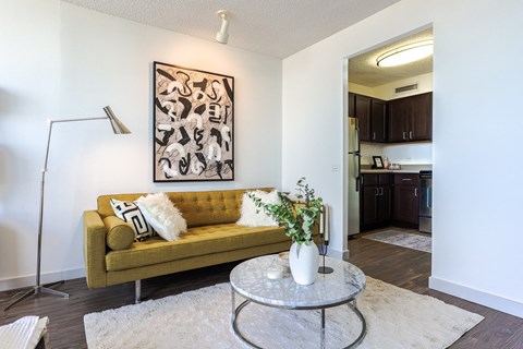 a living room with a couch and a coffee table at Presidential Towers in Chicago, 60661