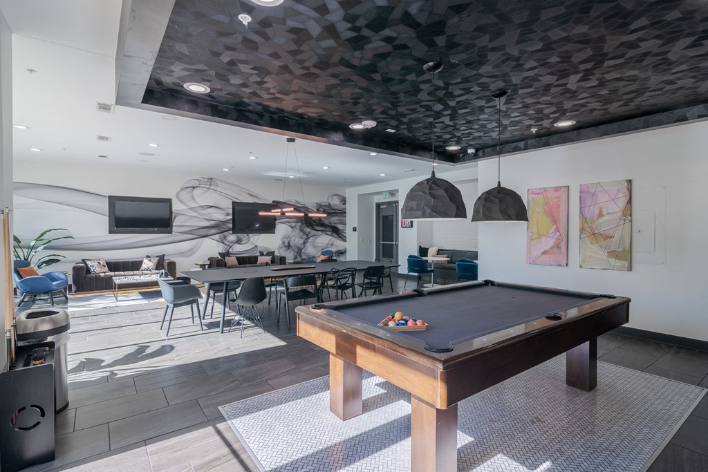 Billiards Table in an Updated Resident Clubhouse at Abstract at Design District in Dallas TX, 75207